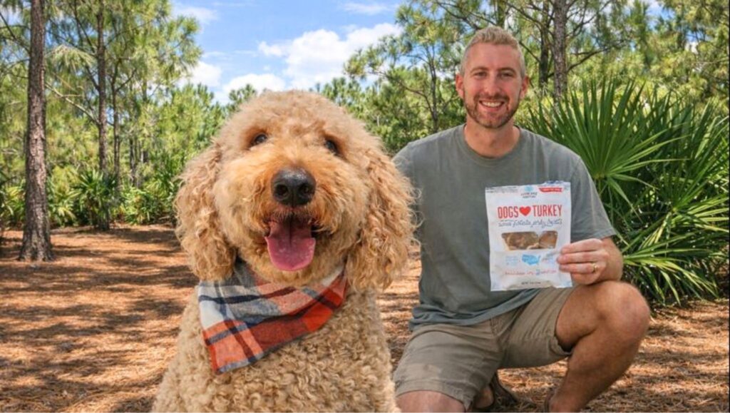 image of a dog and dogs love jerky treats with their owner outside