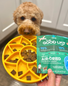 image of dog with enrichment toy and the good list